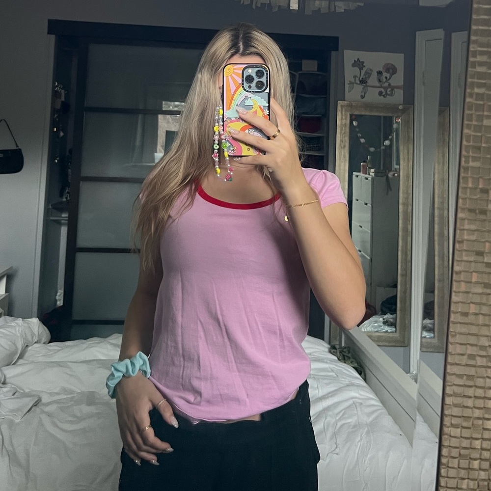 Pink tee with red trim